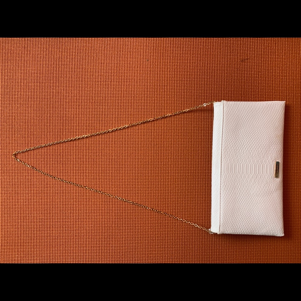 White purse clutch / crossbody. New and unused.